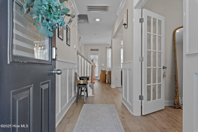 entrance foyer with light hardwood / wood-style flooring