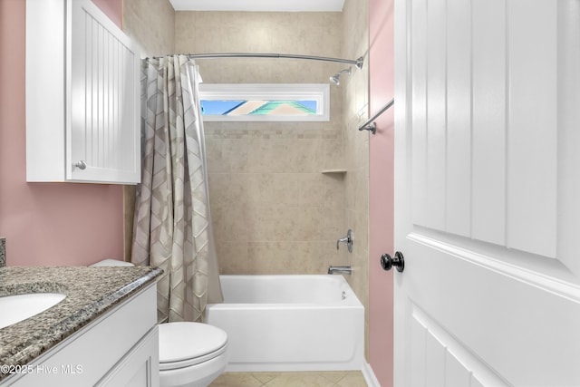 full bathroom featuring toilet, vanity, shower / tub combo, and tile patterned floors