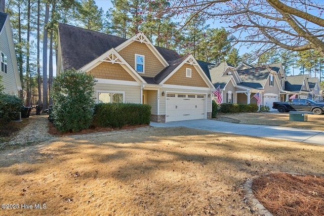 view of front facade with driveway and an attached garage