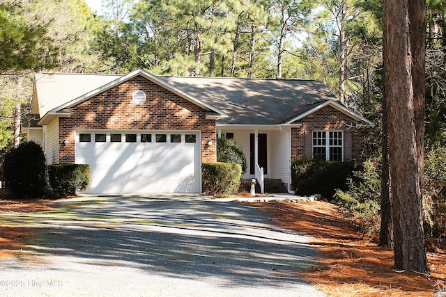 ranch-style home with a garage