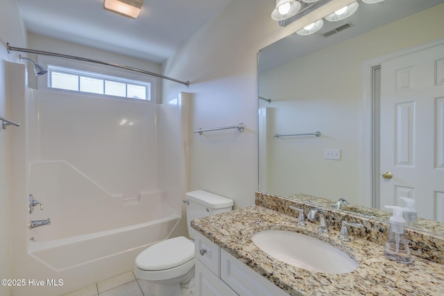 full bathroom with visible vents, toilet, washtub / shower combination, vanity, and tile patterned floors