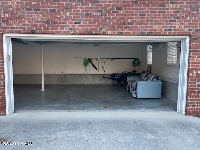 garage with driveway