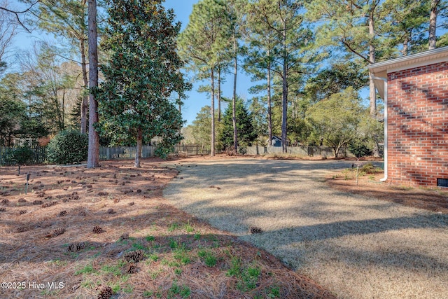 view of yard featuring fence