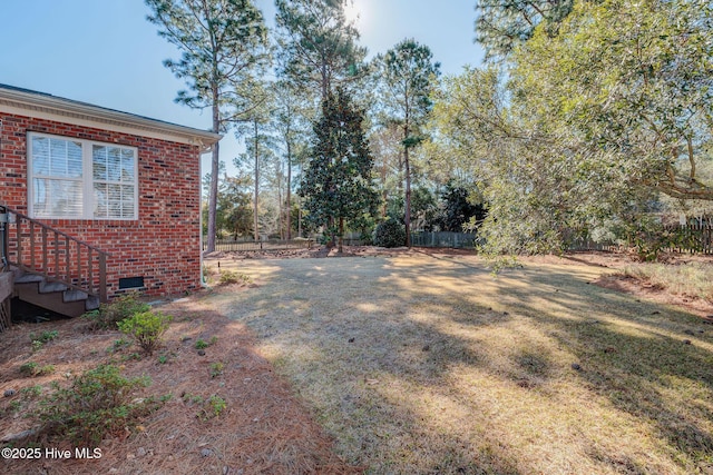 view of yard featuring fence