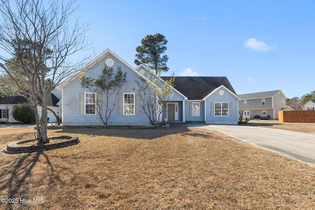 single story home with a front yard