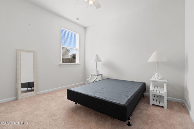 bedroom featuring a ceiling fan, carpet flooring, visible vents, and baseboards