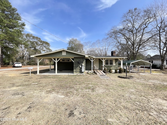 view of front of home featuring a carport and a porch