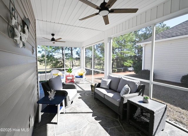 sunroom / solarium with ceiling fan and a wealth of natural light