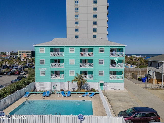 view of pool featuring a patio area