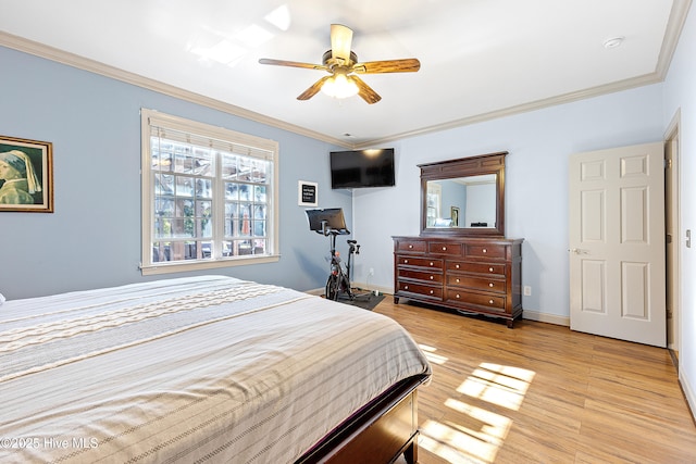 bedroom with light wood-type flooring, baseboards, ornamental molding, and ceiling fan