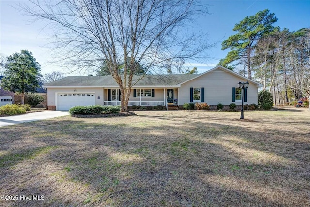 ranch-style home featuring a porch, a garage, and a front yard