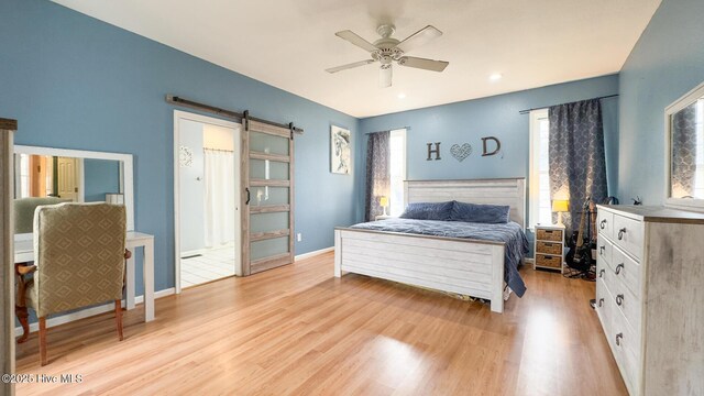 bathroom featuring a chandelier, tile patterned flooring, vanity, and baseboards