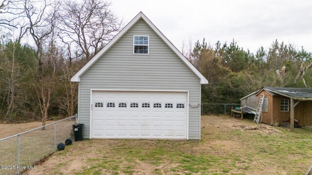 back of property with a sunroom, entry steps, crawl space, and roof with shingles