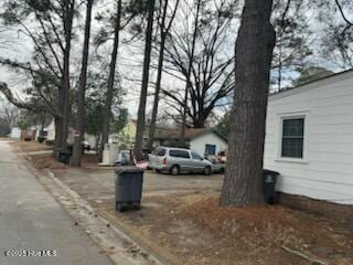 view of street featuring curbs