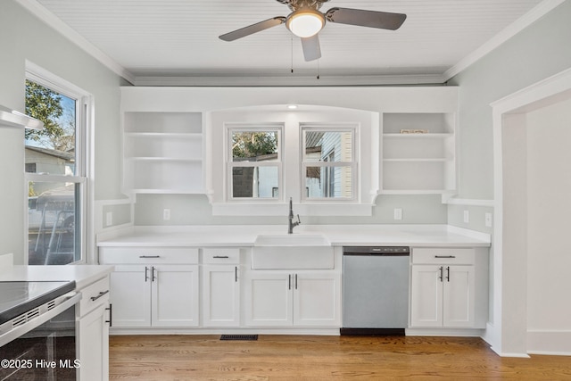 kitchen featuring open shelves, stainless steel appliances, light countertops, white cabinets, and a sink