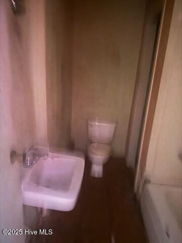 617 Myrtle Ave, Rocky Mount, NC 27801 - bathroom with toilet, walk in shower, and a washtub