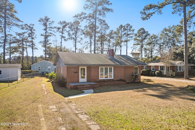 view of front of home featuring a front yard