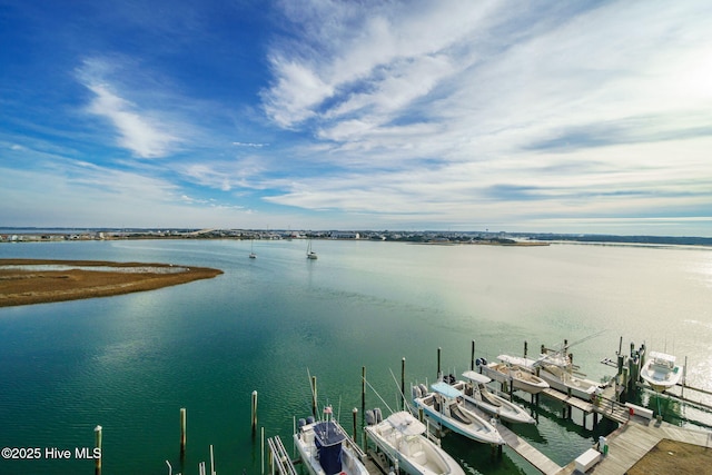 view of water feature with a dock and boat lift