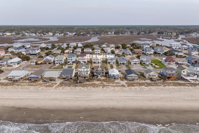 2017 W Beach Dr, Oak Island, NC 28465 - aerial view of residential area featuring expansive beach