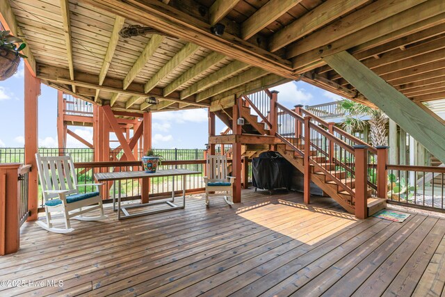 2017 W Beach Dr, Oak Island, NC 28465 - wooden deck with stairway