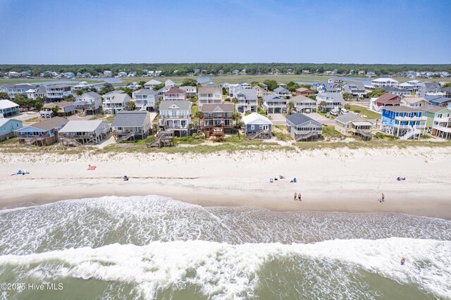 2017 W Beach Dr, Oak Island, NC 28465 - aerial view of residential area featuring unending shoreline