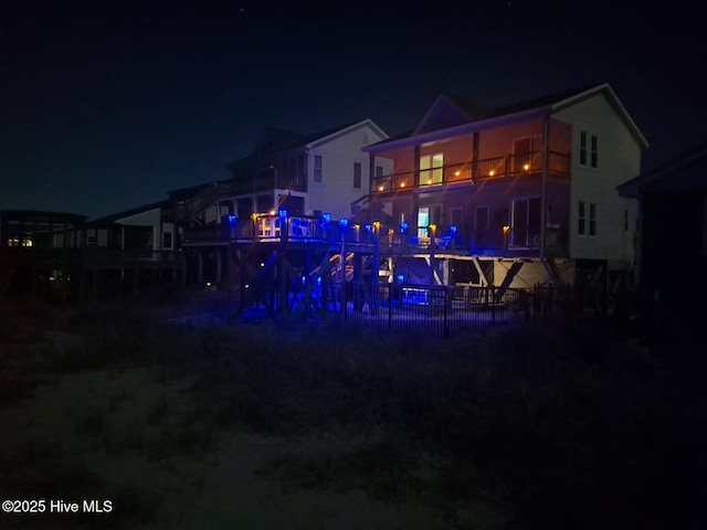 2017 W Beach Dr, Oak Island, NC 28465 - view of back of house at night