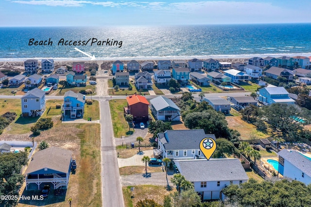 aerial view featuring a water view and a residential view