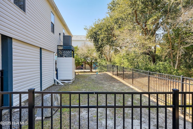 view of yard featuring a playground and fence