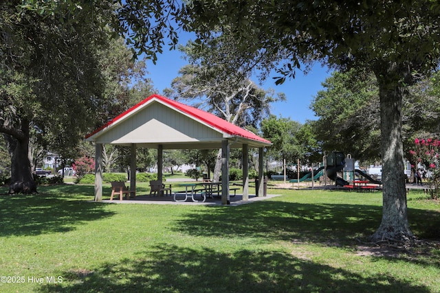 view of home's community with playground community, a lawn, and a gazebo