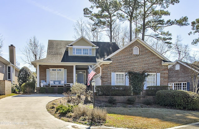 view of front of home featuring covered porch