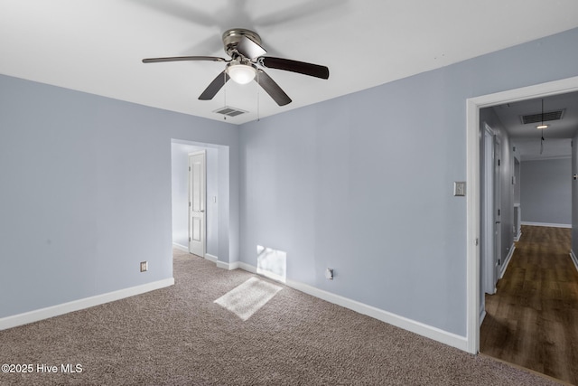 carpeted empty room with ceiling fan