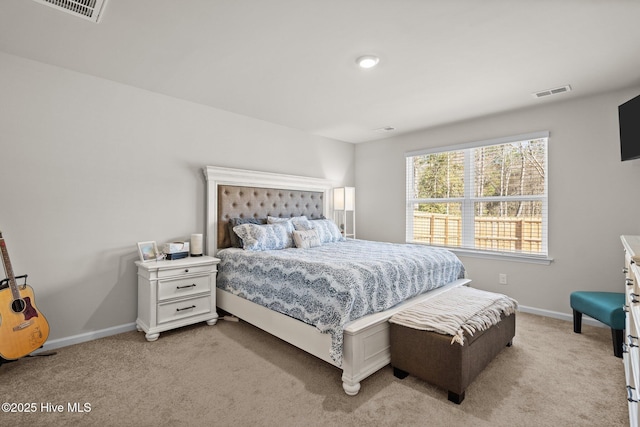 bedroom with light carpet