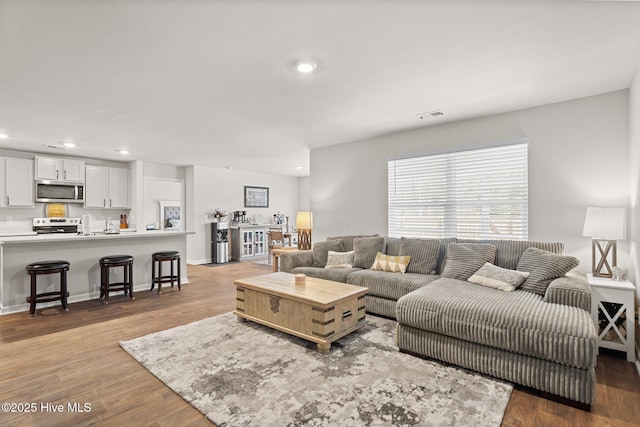 living room with light wood-type flooring