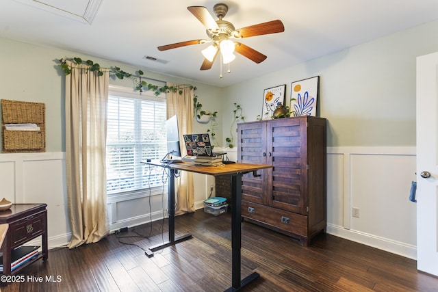 office space featuring ceiling fan and dark hardwood / wood-style flooring