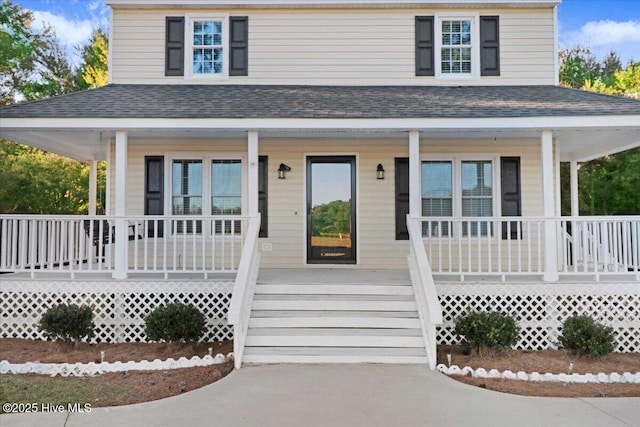 country-style home with a porch