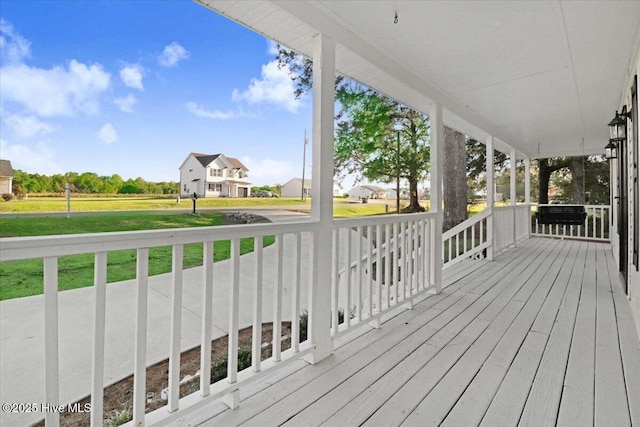 deck featuring covered porch