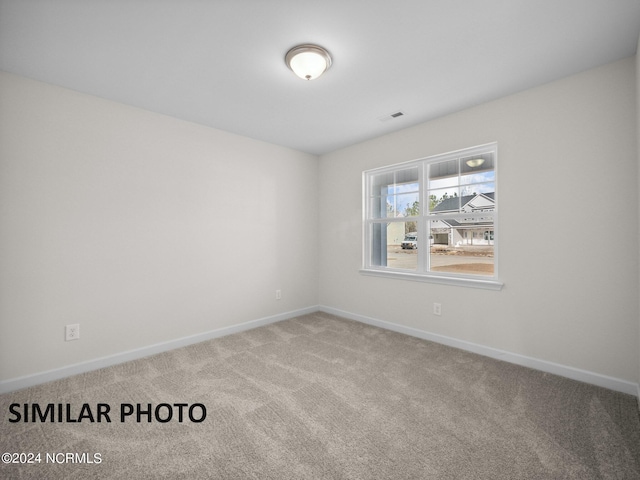 165 Vista Cay Dr, Hubert, NC 28539 - spare room with carpet