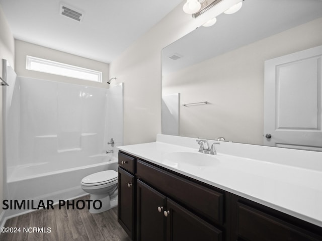 165 Vista Cay Dr, Hubert, NC 28539 - full bathroom featuring vanity, wood-type flooring, shower / bathtub combination, and toilet
