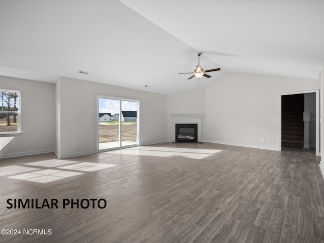 165 Vista Cay Dr, Hubert, NC 28539 - unfurnished living room featuring vaulted ceiling, ceiling fan, and hardwood / wood-style floors