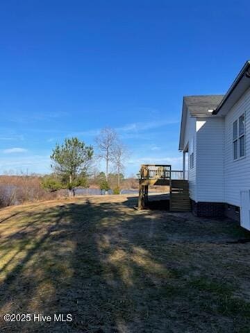 view of yard with a deck