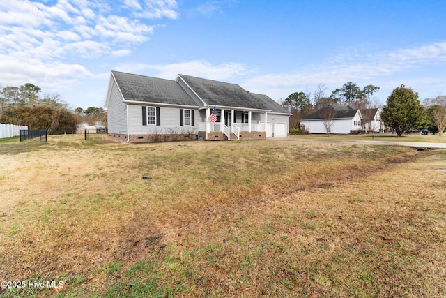 ranch-style home with a shingled roof, a front lawn, fence, crawl space, and an attached garage