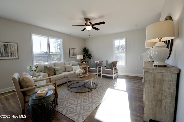 living room with dark hardwood / wood-style floors and ceiling fan