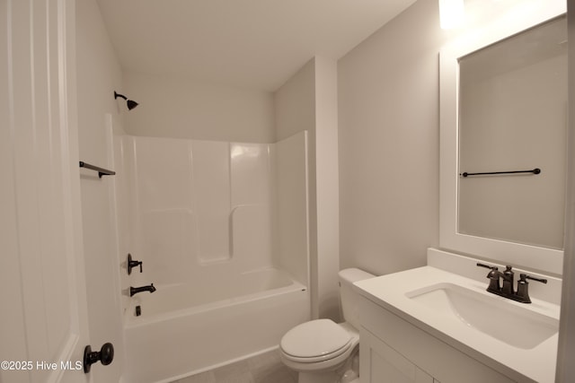 full bathroom with shower / washtub combination, vanity, and toilet