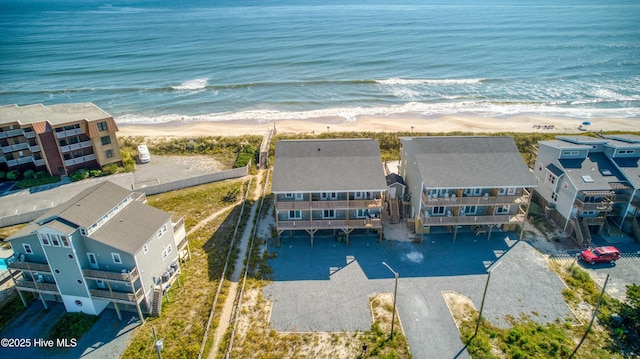 aerial view with a beach view and a water view