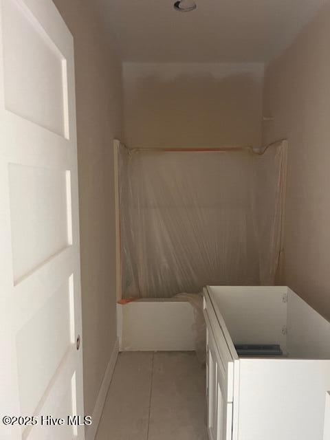 101 Mill Creek Rd, Edenton, NC 27932 - bathroom featuring tile patterned flooring, baseboards, and shower / tub combination