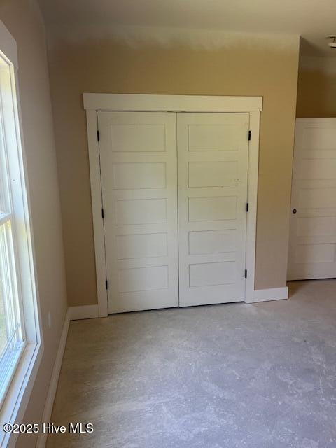 101 Mill Creek Rd, Edenton, NC 27932 - unfurnished bedroom with baseboards and a closet