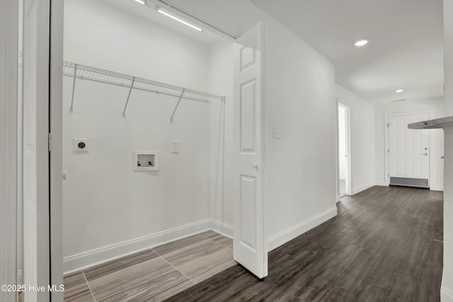 washroom with laundry area, dark wood-type flooring, hookup for a washing machine, and hookup for an electric dryer