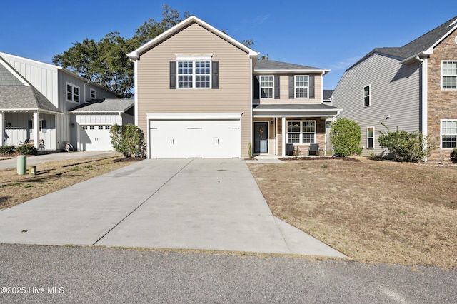 view of front of house featuring a garage and a porch