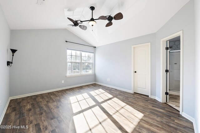 6507 Rustling Leaves Way, Wilmington, NC 28409 - unfurnished bedroom featuring lofted ceiling, dark wood finished floors, baseboards, and ceiling fan