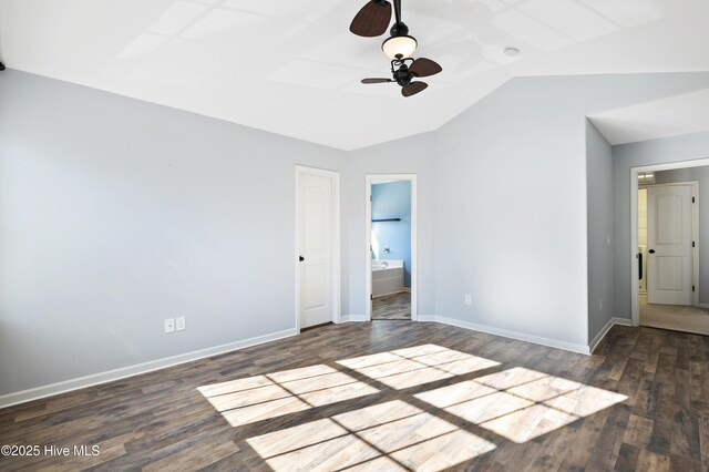 6507 Rustling Leaves Way, Wilmington, NC 28409 - unfurnished bedroom with wood finished floors, vaulted ceiling, baseboards, ensuite bathroom, and a ceiling fan